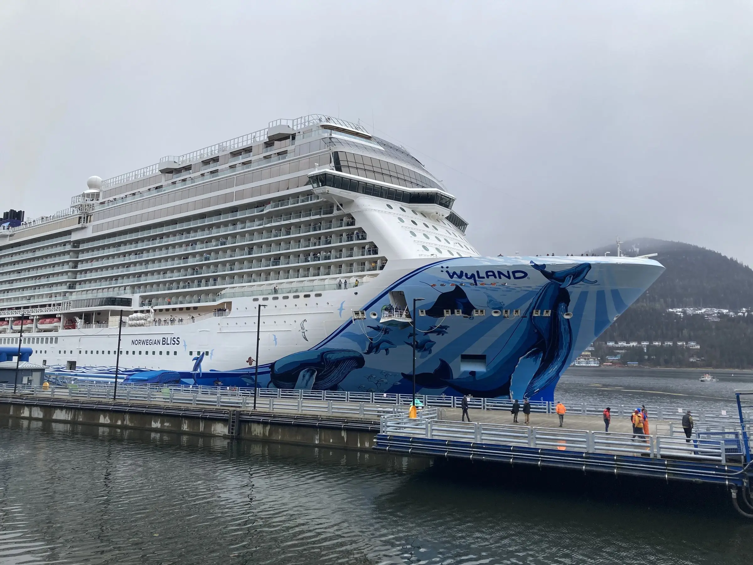 Norwegian Bliss docking in Juneau, Alaska, its bow painted with sea-life hull art